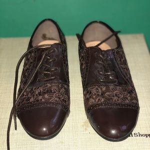 Brown patent leather and lace shoes